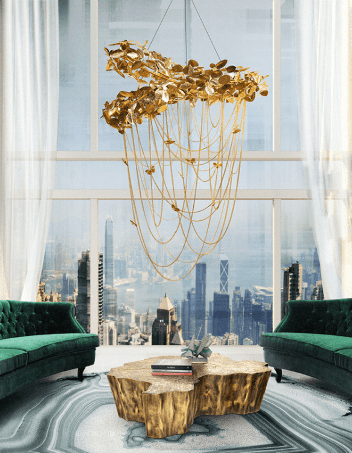luxurious living room with green and golden details
